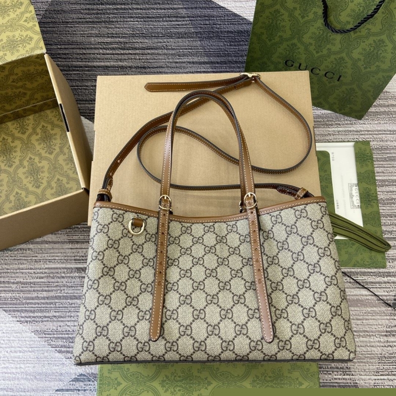 G*u*i shopping bags